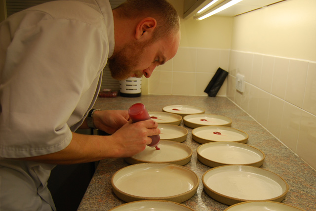 Head Chef Chris White plates up dinner at the Cirencester Opportunity Group